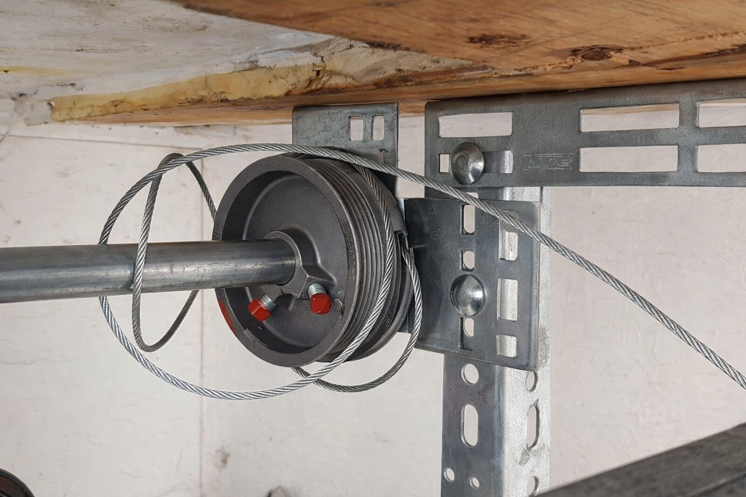 Garage door off track with frayed cable